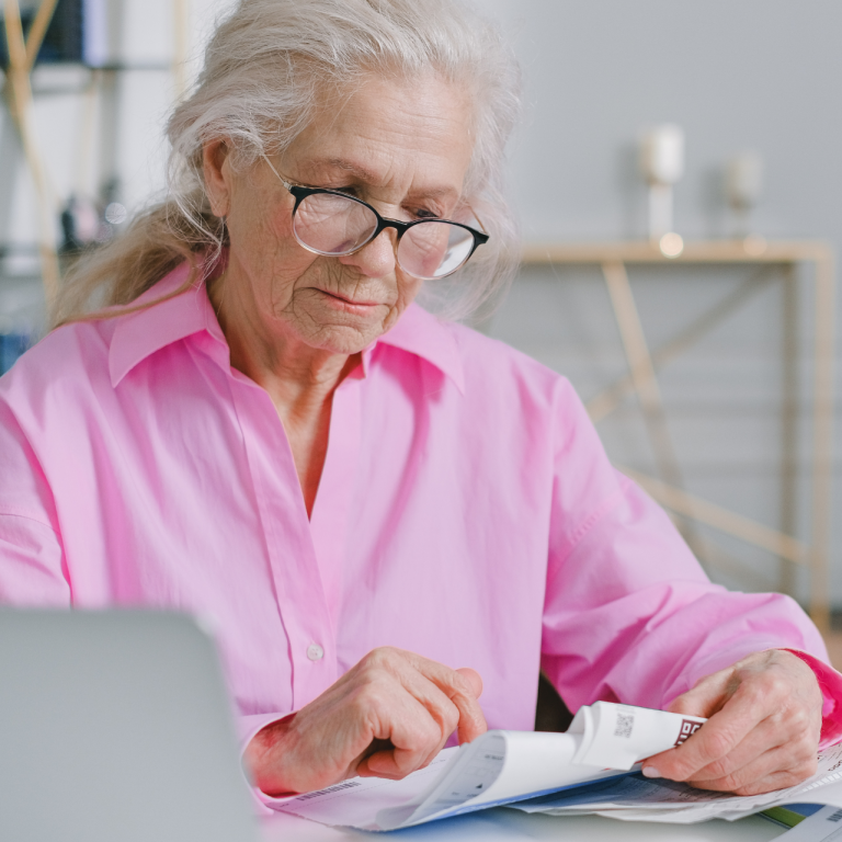 Older lady Attendance Allowance at home service, submitting form to DWP